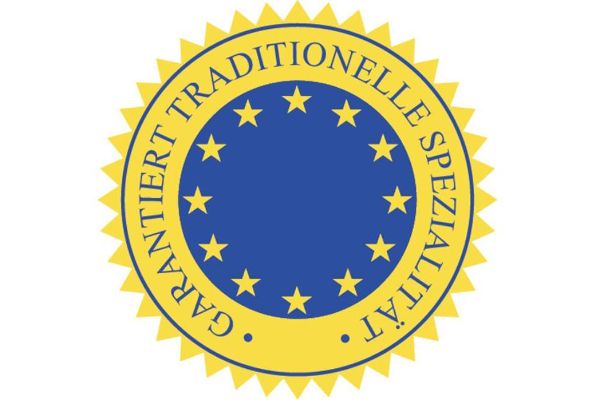 gelb-blaues Siegel mit dem Text: garantiert traditionelle Spezialität