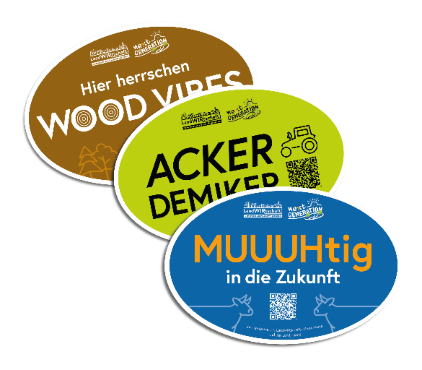 Ansicht drei der verfügbaren Sticker: "MUUUHtig in die Zukunft"; "ACKER-Demiker" sowie "Hier herrschen WOOD VIBES"